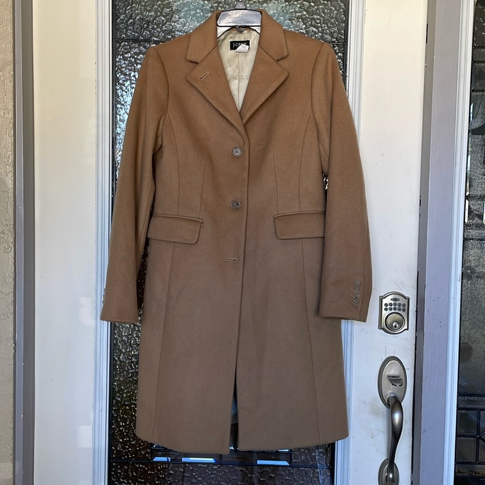 J. Crew ladies camel coat size 2. In new condition. 90% wool and 10% cashmere.